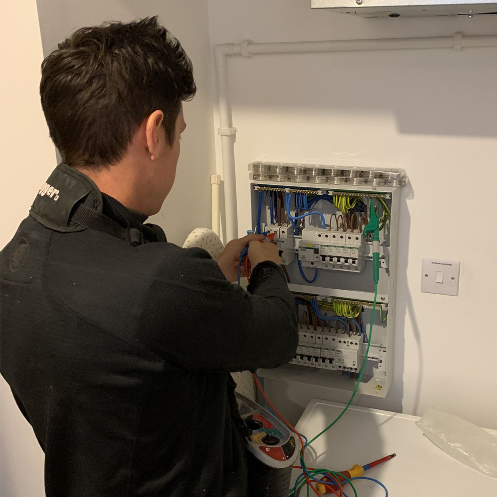 Andrew from APP Electrical testing a consumer unit after a rewire.
